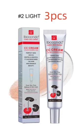 Woman applying Erborian CC Cream to face