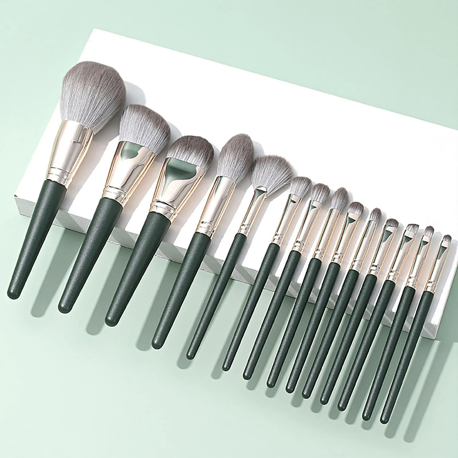 Green makeup brush set with soft bristles for flawless blending